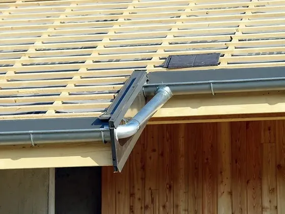 Remplacement de gouttières zinc